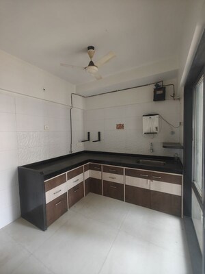 Kitchen in 2 BHK Apartment at Rattan Icon, Seawoods Sector 50 – for Rent