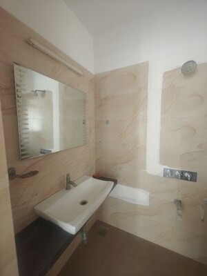 Bathroom in 2 BHK Apartment at Rattan Icon, Seawoods Sector 50 – for Rent