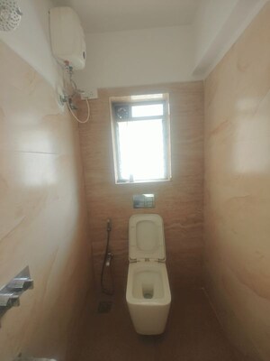 Bathroom in 2 BHK Apartment at Rattan Icon, Seawoods Sector 50 – for Rent