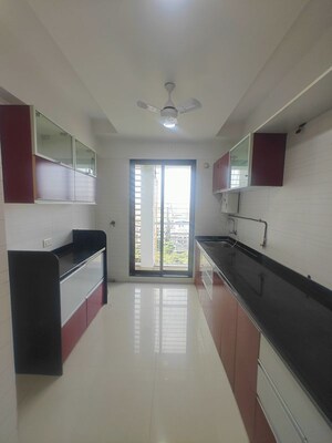 Kitchen in 2 BHK Apartment at Reliable Balaji Heights, Nerul – for Rent