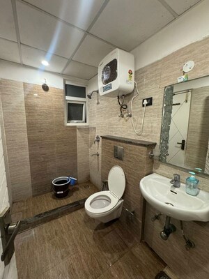 Bathroom in 3 BHK Apartment at NK Sharma Savitry Greens, Lohgarh – for Rent