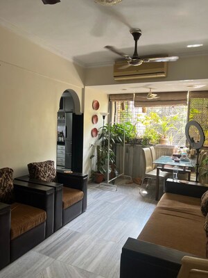 Living Room in 1 BHK Apartment at Seven Bunglow – for Rent