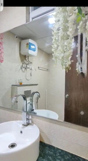 Bathroom in 2.5 BHK Apartment at MI Rustle Court, Gomti Nagar – for Rent