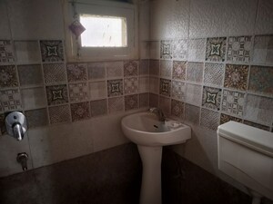 Bathroom in 3 BHK Apartment at Mona Greens, Ghazipur – for Rent