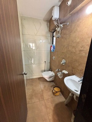 Bathroom in 1 BHK Apartment at Puraniks Kanchanpushp Complex, Kavesar – for Rent