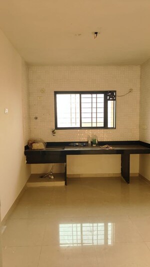 Kitchen in 1 BHK Apartment at Ujwal Paradise, Dhayari – for Sale