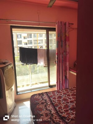 Bedroom in 2 BHK Apartment at Pranjee Garden City Phase 2, Katrap – for Rent