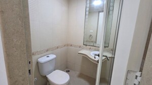 Bathroom in 1 BHK Apartment at Puranik Hometown, Ghodbunder Road – for Rent