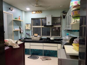 Kitchen in 1 BHK Apartment at Puranik Hometown, Ghodbunder Road – for Rent