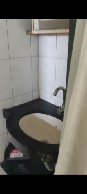 Bathroom in 1 BHK Apartment at Tilak Nagar – for Rent