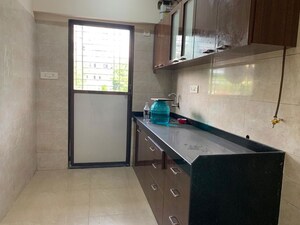 Kitchen in 2 BHK Apartment at Ameet Tower, Chembur – for Rent