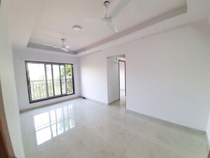 Living Room in 1.5 BHK Apartment at Prayag Heights, Dindoshi – for Sale