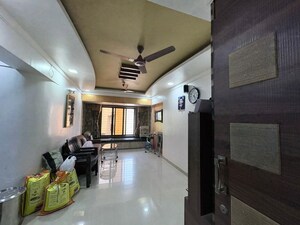 Living Room in 2 BHK Apartment at Royal Amber Apartment, Malad West – for Rent