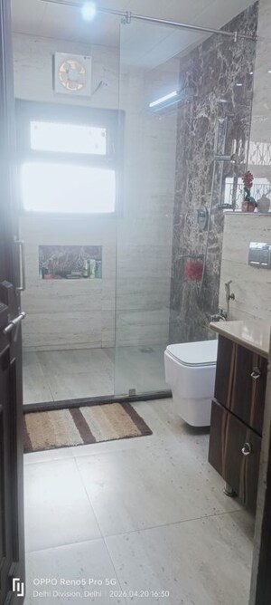 Bathroom in 3 BHK Apartment at Janakpuri – for Sale