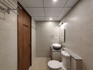 Bathroom in  Apartment at Bhartiya City Nikoo Homes 4, Thanisandra Main Road – for Rent