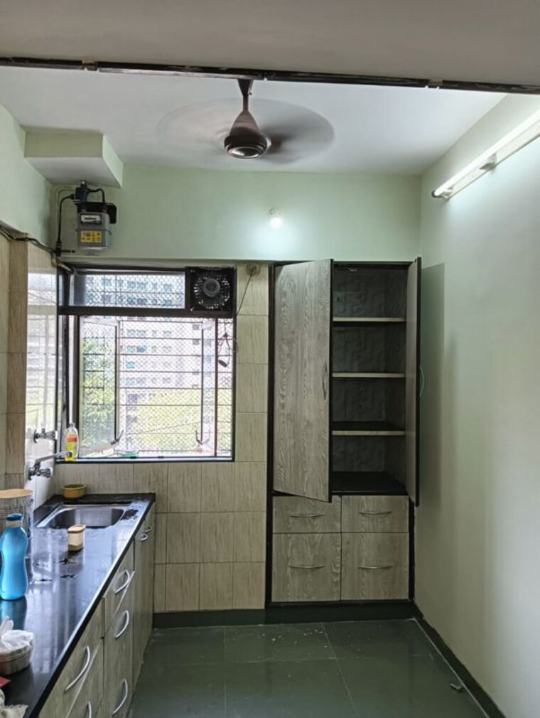 Kitchen, dosti-group-maitri-gardens 2 Bedroom 875 Sq.Ft. Apartment In Oswal Park Thane 10328008