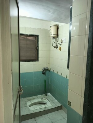 Bathroom in 2 BHK Apartment at Dosti Group Maitri Gardens, Oswal Park – for Rent