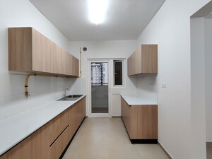 Kitchen in 3 BHK Apartment at Bhartiya City Nikoo Homes 4, Thanisandra Main Road – for Sale