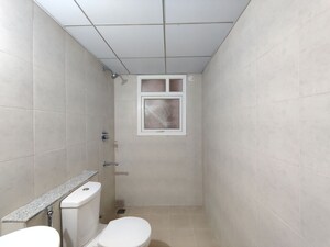 Bathroom in 3 BHK Apartment at Bhartiya City Nikoo Homes 4, Thanisandra Main Road – for Sale