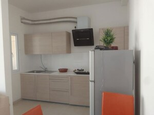 Kitchen in 2.5 BHK Apartment at Bhartiya Nikoo Homes, Thanisandra Main Road – for Rent
