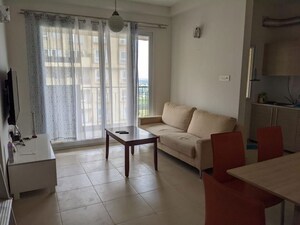 Living Room in 2.5 BHK Apartment at Bhartiya Nikoo Homes, Thanisandra Main Road – for Rent