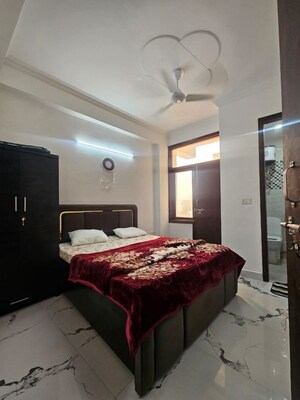 Bedroom in 1.5 BHK Builder Floor at Freedom Fighters Enclave – for Rent