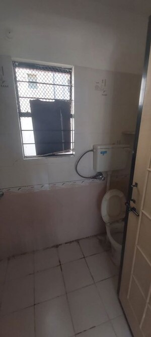 Bathroom in 2 BHK Apartment at Kunal Icon, Pimple Saudagar – for Rent