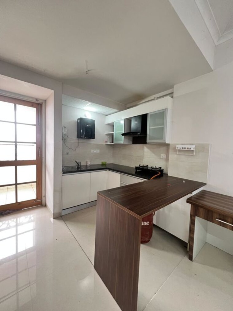 Kitchen, ansal-sushant-golf-city-celebrity-gardens 3 Bedroom 1746 Sq.Ft. Apartment In Sushant Golf City Lucknow 10328180