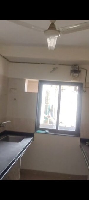 Kitchen in 2 BHK Apartment at Sudarshan Sky Garden, Ghodbunder Road – for Rent