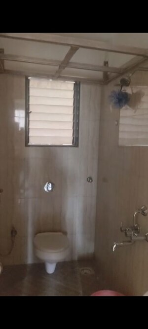 Bathroom in 2 BHK Apartment at Sudarshan Sky Garden, Ghodbunder Road – for Rent