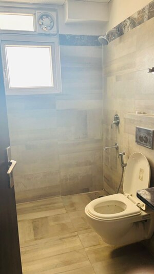 Bathroom in 3.5 BHK Apartment at Tulsiani Golf View, Gomti Nagar – for Rent
