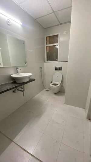 Bathroom in 3.5 BHK Apartment at Tulsiani Golf View, Gomti Nagar – for Rent