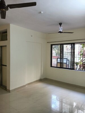 Room in 2 BHK Apartment at Himgiri Lokupvan Phase II CHS Ltd, Vasant Vihar – for Rent