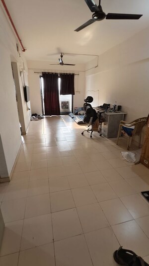 Living Room in 2 BHK Apartment at Gera World of Joy, Kharadi – for Rent