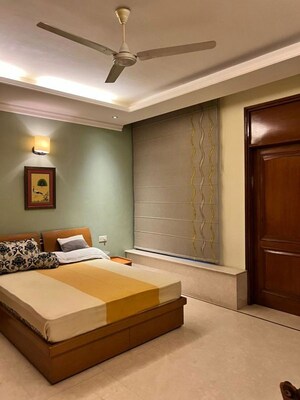 Bedroom in 4 BHK Builder Floor at Defence Colony – for Rent