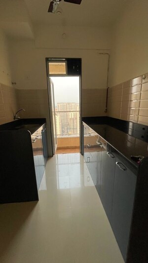 Kitchen in 2 BHK Apartment at JP North Imperia, Mira Road – for Rent