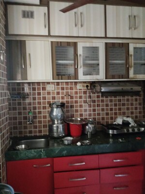 Kitchen in 1 BHK Apartment at Yashraj Park CHS, Kasarvadavali – for Rent