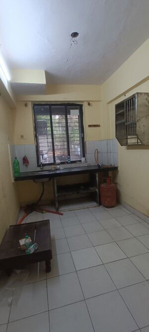 Kitchen in 1 RK Apartment at Fam CHS, Kopar Khairane – for Rent