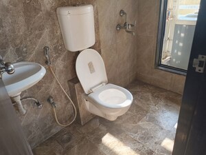 Bathroom in 1 BHK Apartment at Haware Dahlia, Kasarvadavali – for Rent