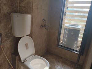 Bathroom in 1 BHK Apartment at Haware Dahlia, Kasarvadavali – for Rent