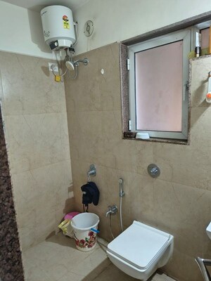 Bathroom in 1 BHK Apartment at Rutu Enclave, Kasarvadavali – for Rent