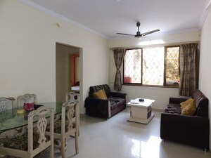 Living Room in 2 BHK Apartment at Kalpataru Classic, Malad West – for Rent