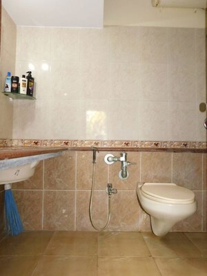 Bathroom in 2 BHK Apartment at Kalpataru Classic, Malad West – for Rent