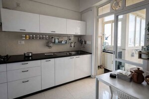 Kitchen in 4 BHK Apartment at Hiranandani Brookhill, Ghodbunder Road – for Rent