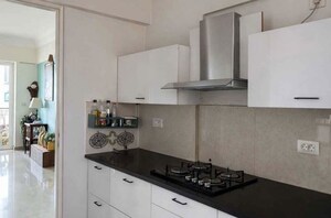 Kitchen in 4 BHK Apartment at Hiranandani Brookhill, Ghodbunder Road – for Rent
