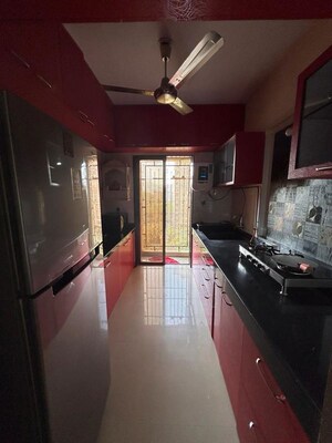 Kitchen in 2 BHK Apartment at Madhav Palacia, Ghodbunder Road – for Rent