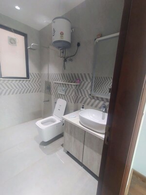 Bathroom in 4 BHK Builder Floor at Ansal API Versalia, Sector 67a – for Rent