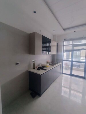 Kitchen in 4 BHK Builder Floor at Ansal API Versalia, Sector 67a – for Rent