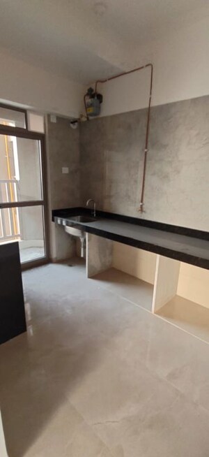 Kitchen in 2 BHK Apartment at Sheth Auris Bliss, Malad West – for Rent