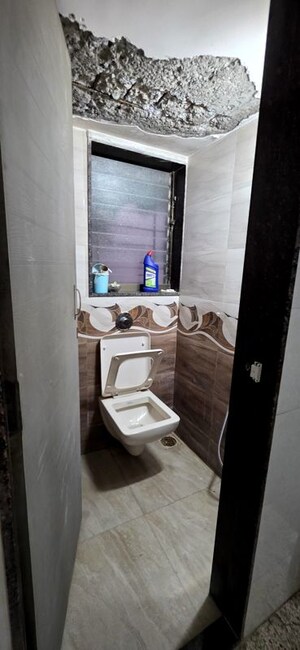 Bathroom in 1 BHK Apartment at Jay Amrat Apartment, Malad West – for Sale